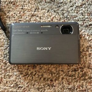 Sony DSC-TX7 10.2MP CMOS Digital Camera,4x Zoom 3.5” Touch Screen LCD